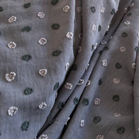 Elegant fancy cotton jacquard fabric in a deep lilac grey shade with a subtle woven texture.