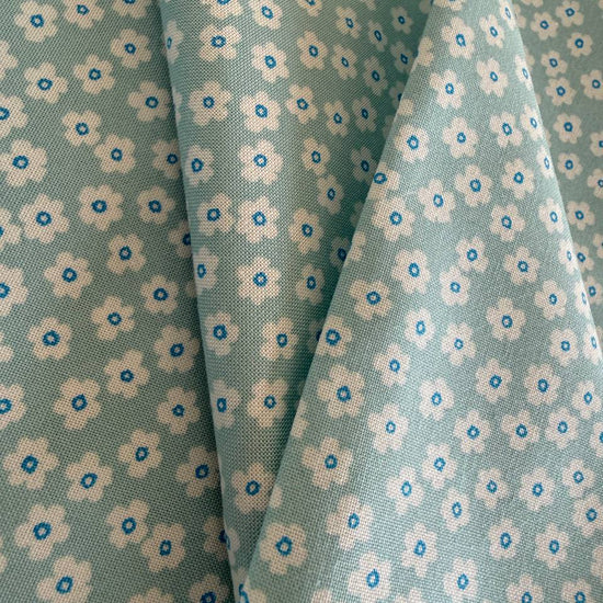 light blue fabric with small white daisy floral pattern for sewing and quilting – Sasha’s Atelier Canada