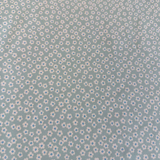 light blue fabric with small white daisy floral pattern for sewing and quilting – Sasha’s Atelier Canada