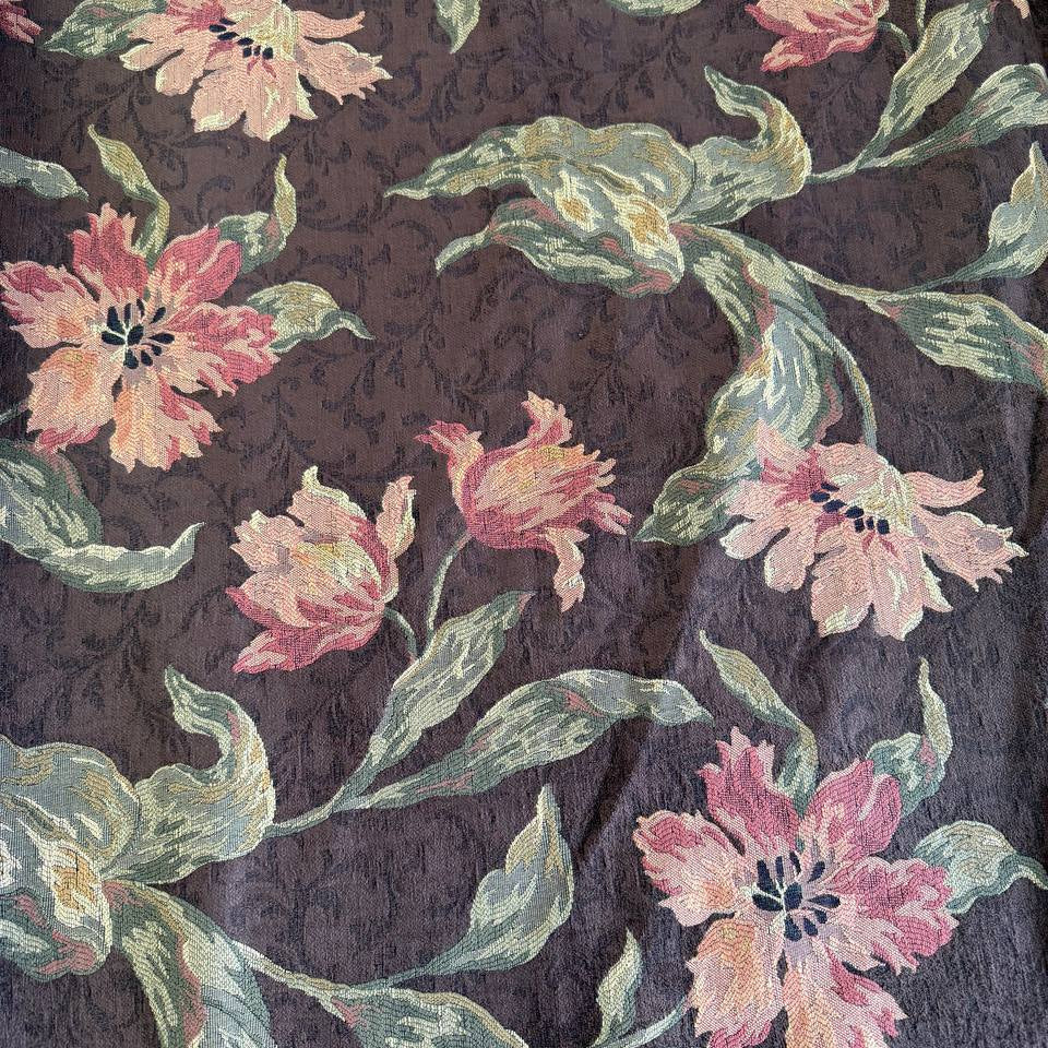 Heavy decorative tapestry fabric with a rich floral pattern in warm autumn tones.