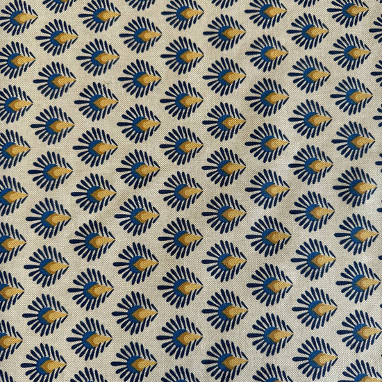 Beautiful 100% cotton home décor fabric with a structured weave and decorative botanical pattern in deep blue and warm mustard tones on a natural background.