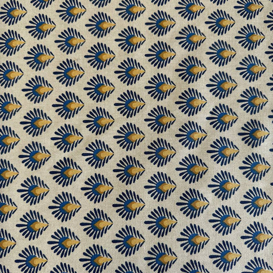 Beautiful 100% cotton home décor fabric with a structured weave and decorative botanical pattern in deep blue and warm mustard tones on a natural background.