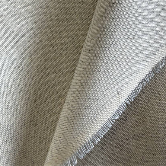 Soft neutral home décor fabric with a natural linen-look texture.