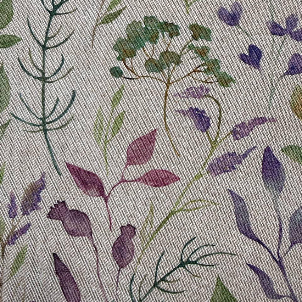 Decorative home décor fabric featuring a soft floral print in purple and green tones on a natural base.