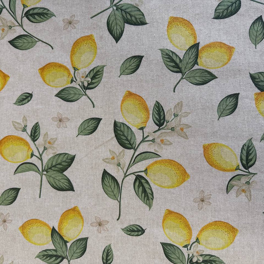Elegant home décor fabric featuring a fresh botanical lemon print on a soft ivory background. 