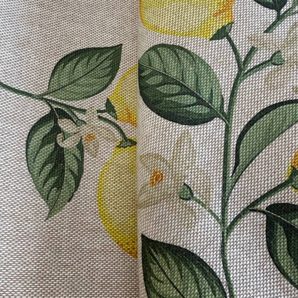 Elegant home décor fabric featuring a fresh botanical lemon print on a soft ivory background. 