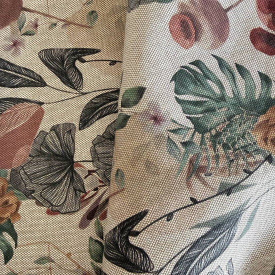 Elegant home décor fabric featuring a beautiful tropical botanical print with leaves, florals, and natural plant elements