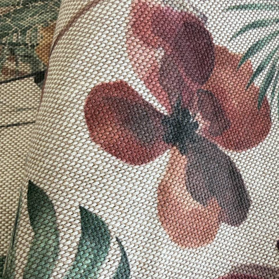 Elegant home décor fabric featuring a beautiful tropical botanical print with leaves, florals, and natural plant elements