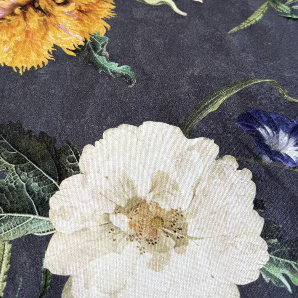 Elegant home décor fabric featuring a dramatic botanical floral print on a deep charcoal background