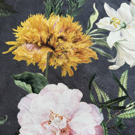 Elegant home décor fabric featuring a dramatic botanical floral print on a deep charcoal background