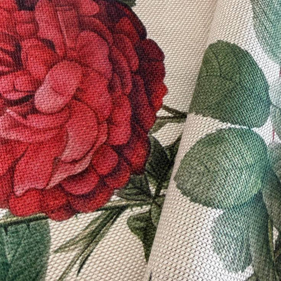 Elegant cotton fabric featuring a beautiful vintage botanical rose print on a soft ivory background.