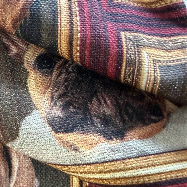 Unique cotton fabric with a playful vintage-style dog portrait print.