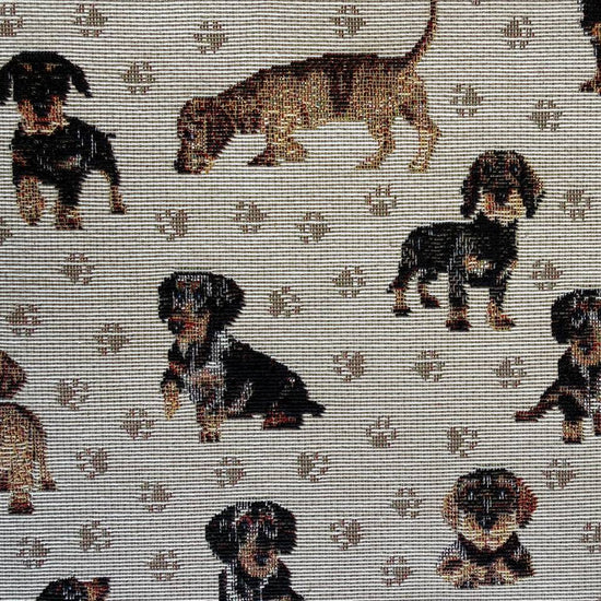 Decorative tapestry upholstery fabric featuring charming dog motifs on a soft beige background.