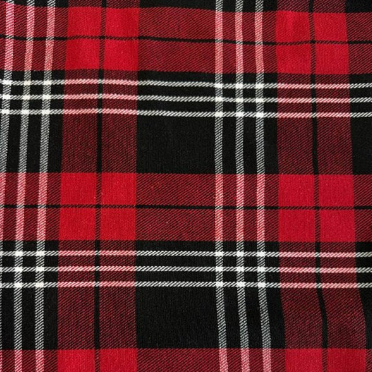 Red and black plaid fabric close-up tartan pattern textile