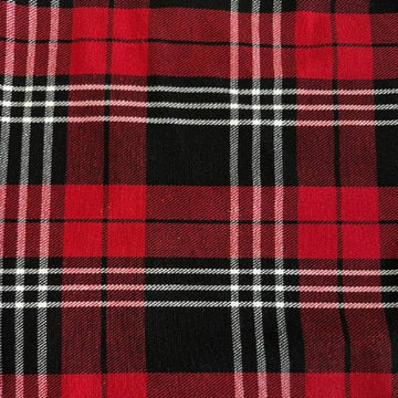 Red and black plaid fabric close-up tartan pattern textile
