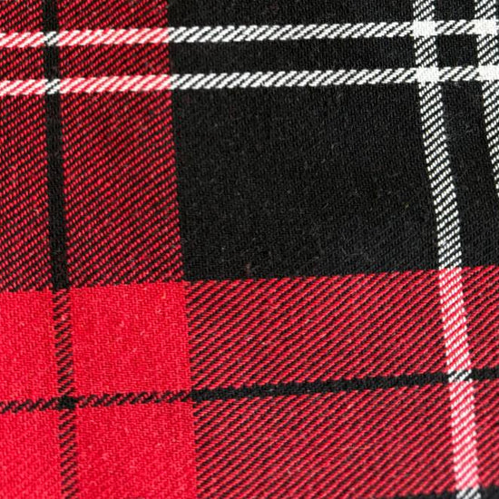 Red and black plaid fabric close-up tartan pattern textile