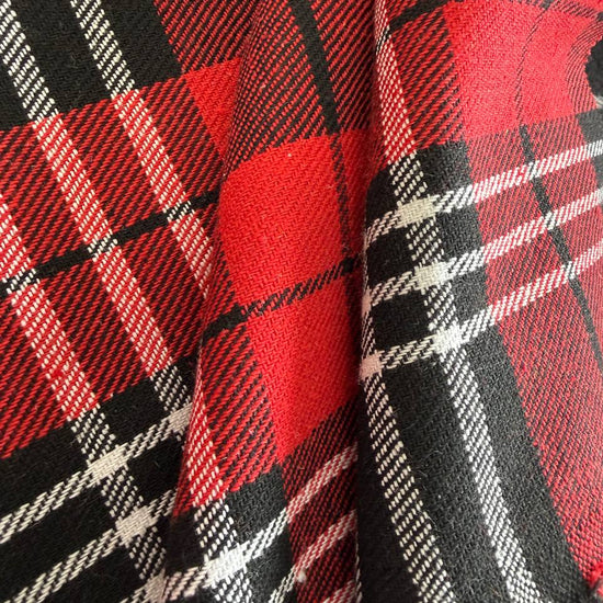 Red and black plaid fabric close-up tartan pattern textile