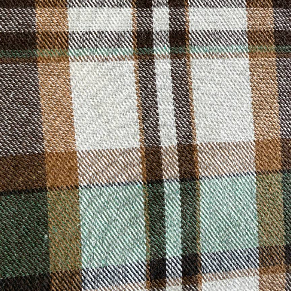 Green brown plaid yarn dyed fabric fiber composition label