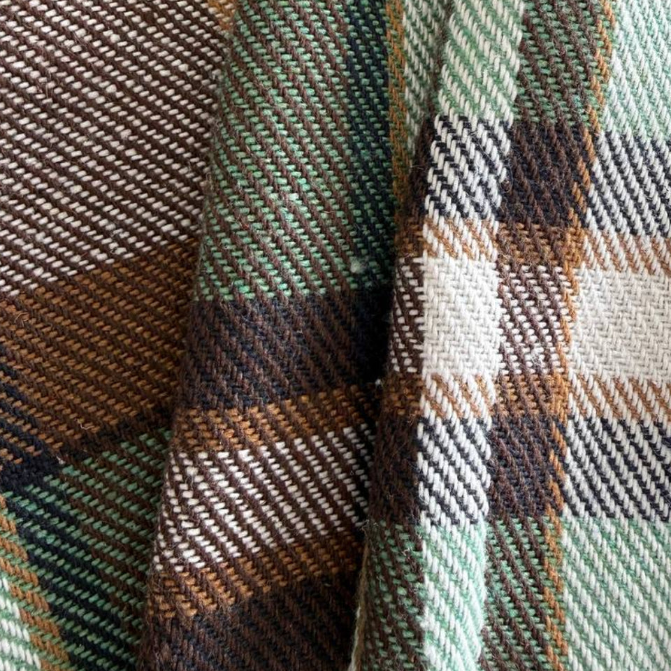 Green brown plaid yarn dyed fabric fiber composition label