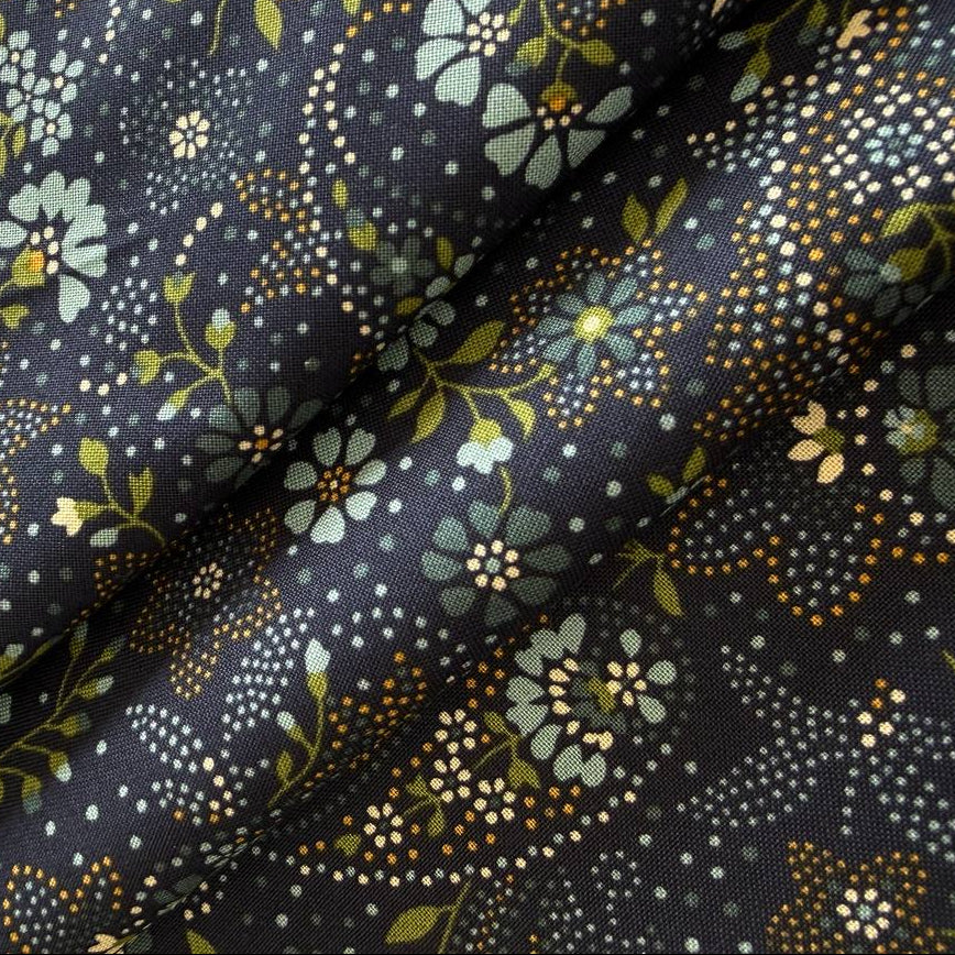 Chelsea Garden Drizzle floral cotton fabric by Moda Fabrics with small blue flowers on dark blue background