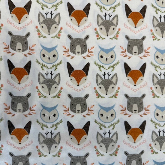 Woodland Wonder by Gingiber for Moda Fabrics featuring foxes, bears, owls, and woodland animals on Cloud, Blush, and Midnight backgrounds, 100% cotton quilting fabric.