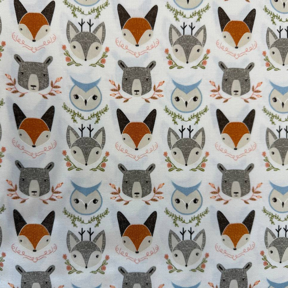 Woodland Wonder by Gingiber for Moda Fabrics featuring foxes, bears, owls, and woodland animals on Cloud, Blush, and Midnight backgrounds, 100% cotton quilting fabric.