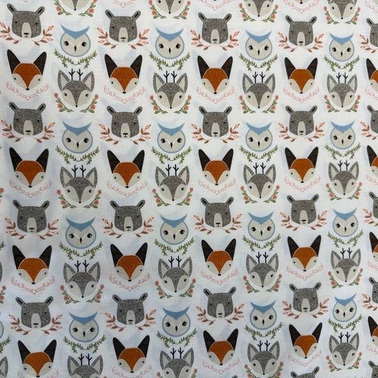 Woodland Wonder by Gingiber for Moda Fabrics featuring foxes, bears, owls, and woodland animals on Cloud, Blush, and Midnight backgrounds, 100% cotton quilting fabric.