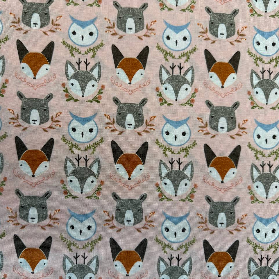 Woodland Wonder by Gingiber for Moda Fabrics featuring foxes, bears, owls, and woodland animals on Cloud, Blush, and Midnight backgrounds, 100% cotton quilting fabric.