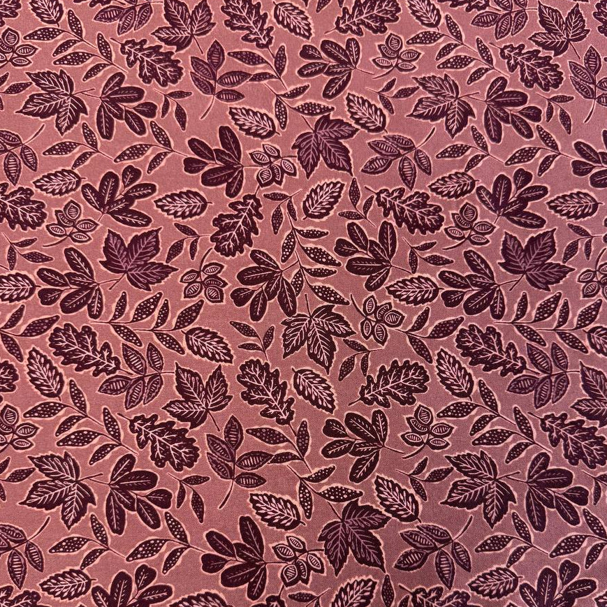 Dusty rose quilting cotton featuring an allover leaf print from Moda Fabrics' Foraged, Found & Hand Me Down collection.