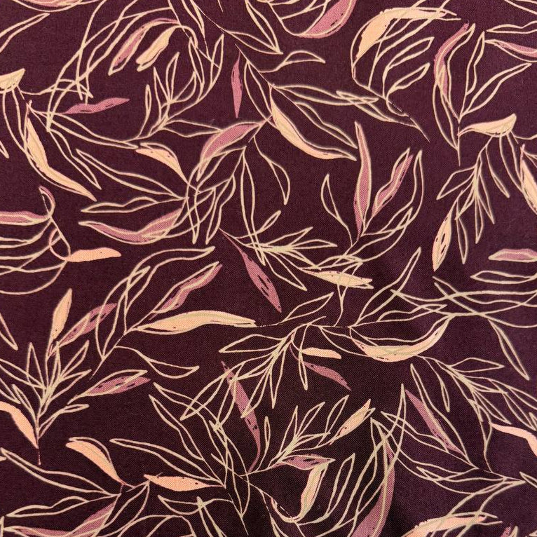 Deep plum quilting cotton featuring delicate scattered leaf silhouettes in mauve and blush tones from the Foraged, Found & Hand Me Down collection by Fancy That Design House for Moda Fabrics.