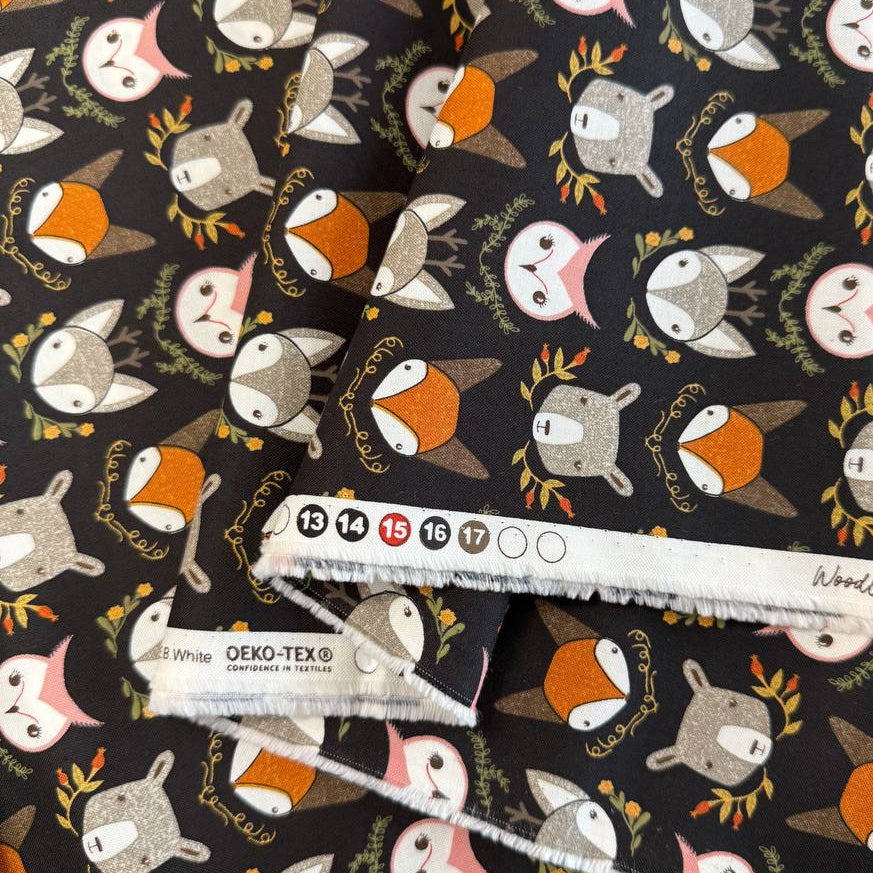 Woodland Wonder by Gingiber for Moda Fabrics featuring foxes, bears, owls, and woodland animals on Cloud, Blush, and Midnight backgrounds, 100% cotton quilting fabric.
