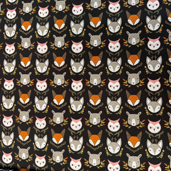 Woodland Wonder by Gingiber for Moda Fabrics featuring foxes, bears, owls, and woodland animals on Cloud, Blush, and Midnight backgrounds, 100% cotton quilting fabric.