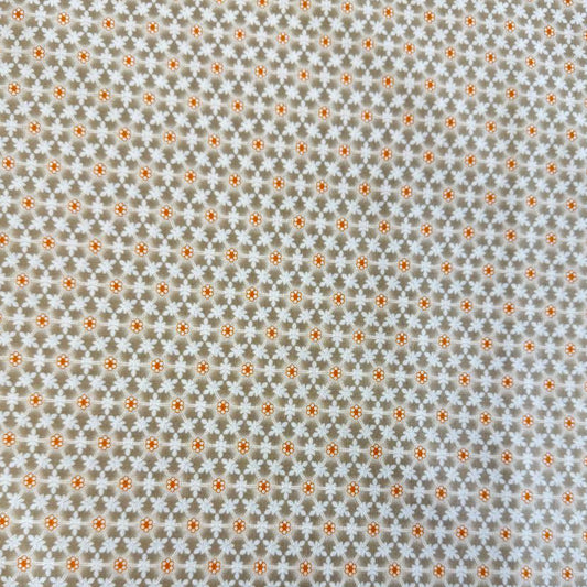 Small white floral lattice print with orange flower centers on a soft taupe smoke background from Agatha Road by Fig Tree & Co. for Moda.