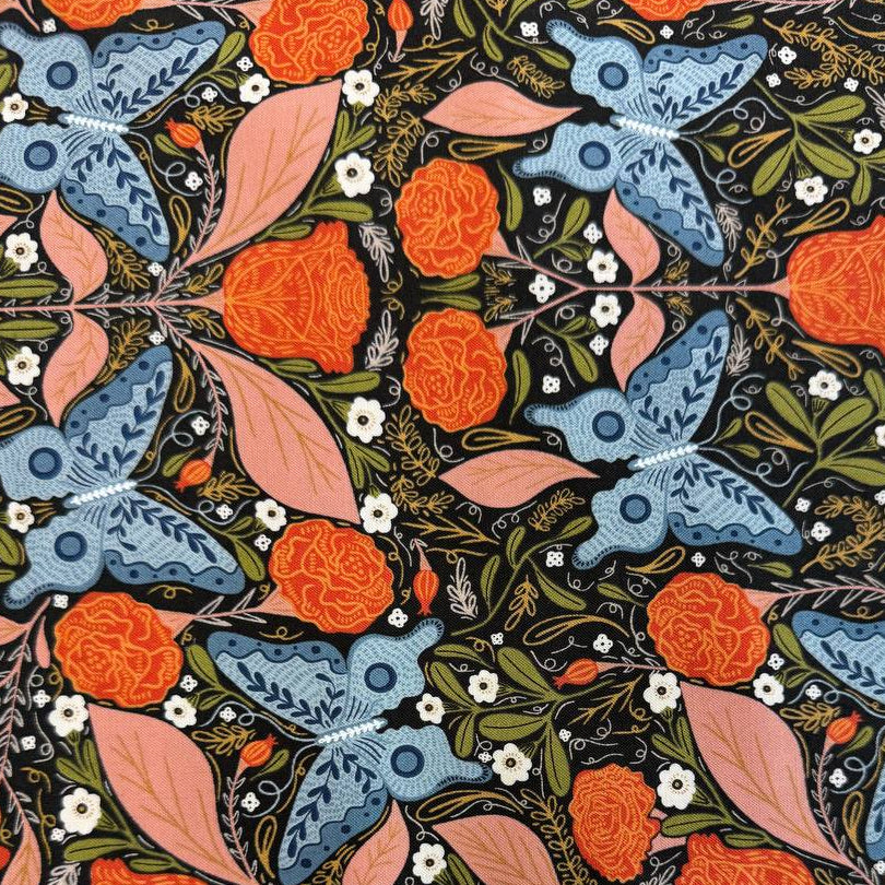 Woodland Wonder Midnight quilting cotton featuring blue butterflies, orange roses, pink leaves, and botanical motifs on a black background by Gingiber for Moda Fabrics.