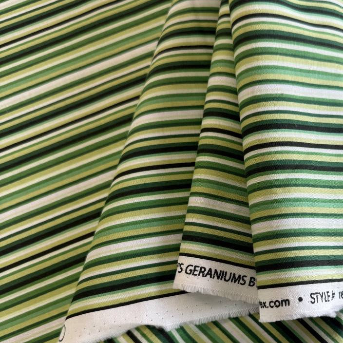 Multi-coloured striped quilting cotton fabric from Betty's Geraniums by Jackie Robinson for Benartex, available in green stripe and pink-red stripe colourways.