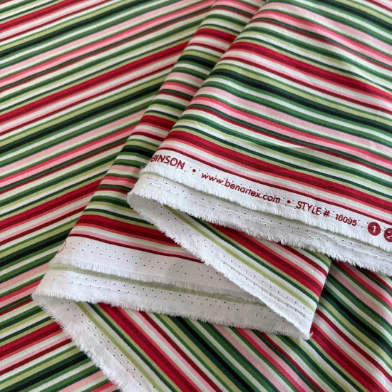 Multi-coloured striped quilting cotton fabric from Betty's Geraniums by Jackie Robinson for Benartex, available in green stripe and pink-red stripe colourways.