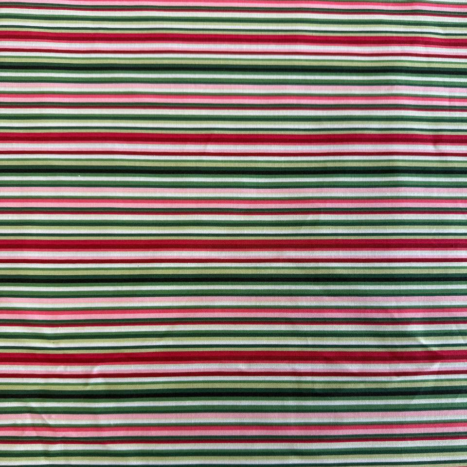 Multi-coloured striped quilting cotton fabric from Betty's Geraniums by Jackie Robinson for Benartex, available in green stripe and pink-red stripe colourways.