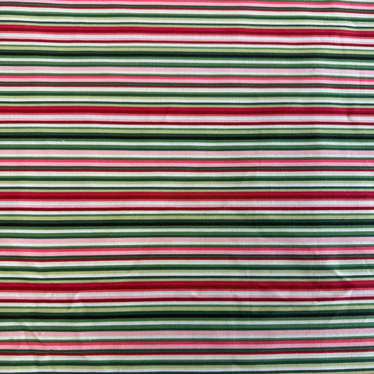 Multi-coloured striped quilting cotton fabric from Betty's Geraniums by Jackie Robinson for Benartex, available in green stripe and pink-red stripe colourways.