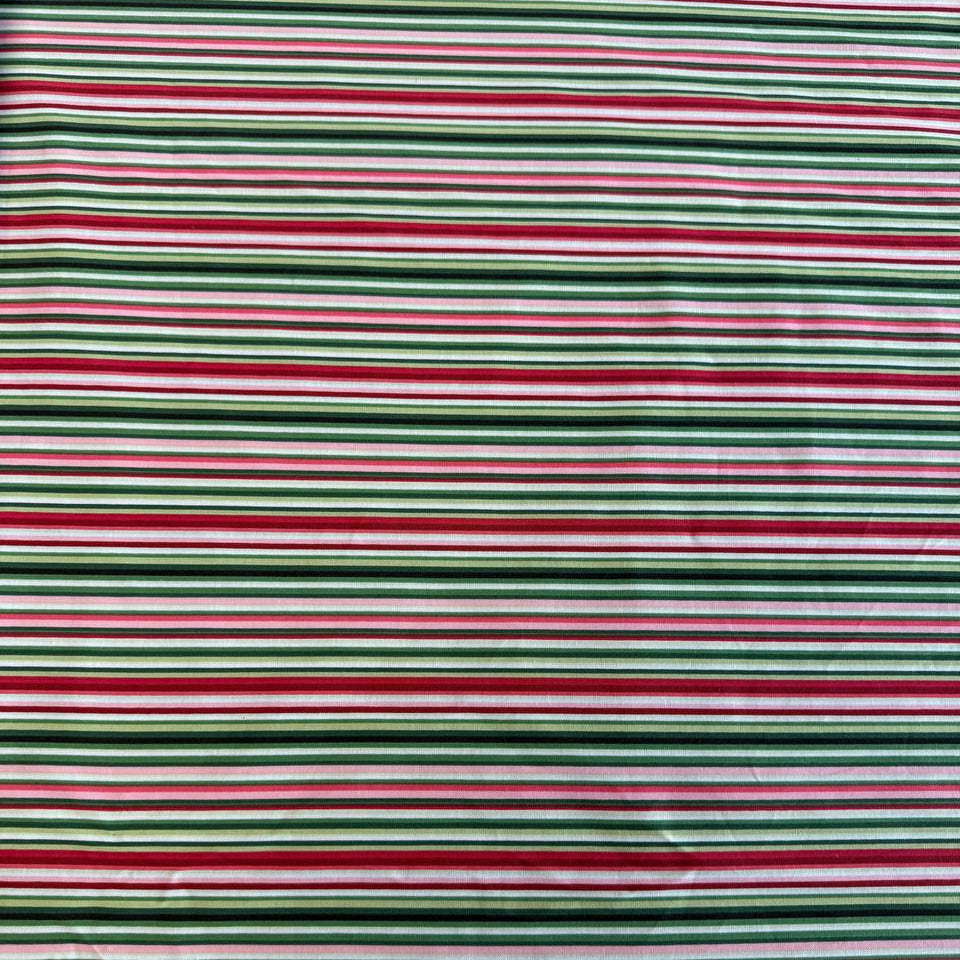 Multi-coloured striped quilting cotton fabric from Betty's Geraniums by Jackie Robinson for Benartex, available in green stripe and pink-red stripe colourways.