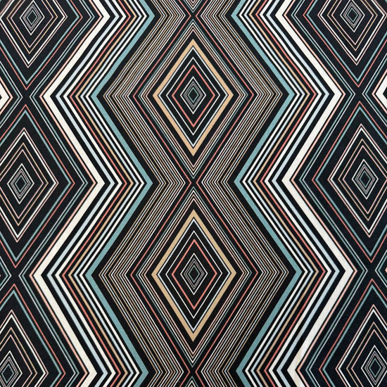 Nightlife geometric quilting fabric by Studio M for Moda Fabrics featuring layered diamond patterns in black, teal, cream, blush, coral, and gold tones.