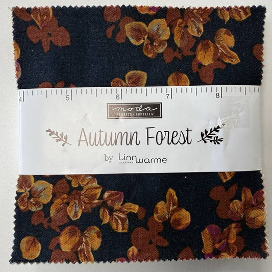 Autumn Forest Charm Pack fabric bundle by Moda Fabrics with 42 precut 5 inch cotton quilting squares in autumn floral prints on navy background