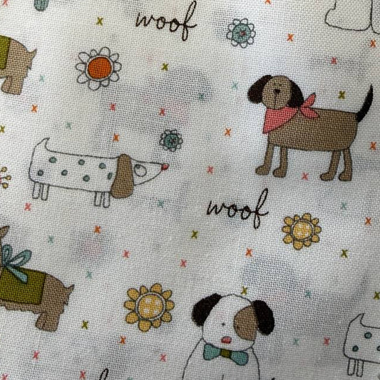 Lucky charm pack fabric bundle by Sweetwater for Moda Fabrics with 42 precut 5 inch cotton quilting squares featuring cute dogs on cream background