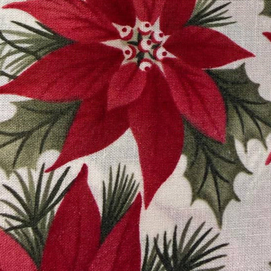 A Christmas Carol Charm Pack by 3 Sisters for Moda Fabrics featuring red poinsettia Christmas quilting cotton prints