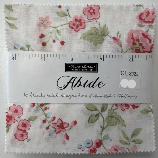 Abide Charm Pack by Brenda Riddle Designs for Moda Fabrics with soft pink floral quilting cotton prints