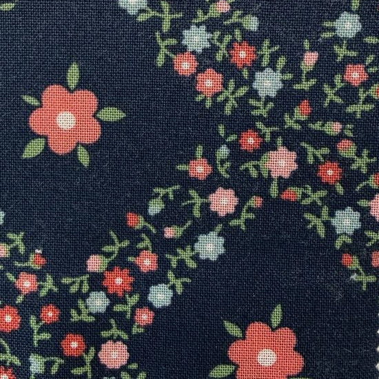 Rosemary Cottage Charm Pack by Camille Roskelley for Moda Fabrics with navy floral quilting cotton prints