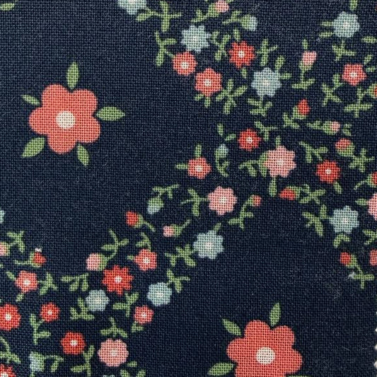 Rosemary Cottage Charm Pack by Camille Roskelley for Moda Fabrics with navy floral quilting cotton prints