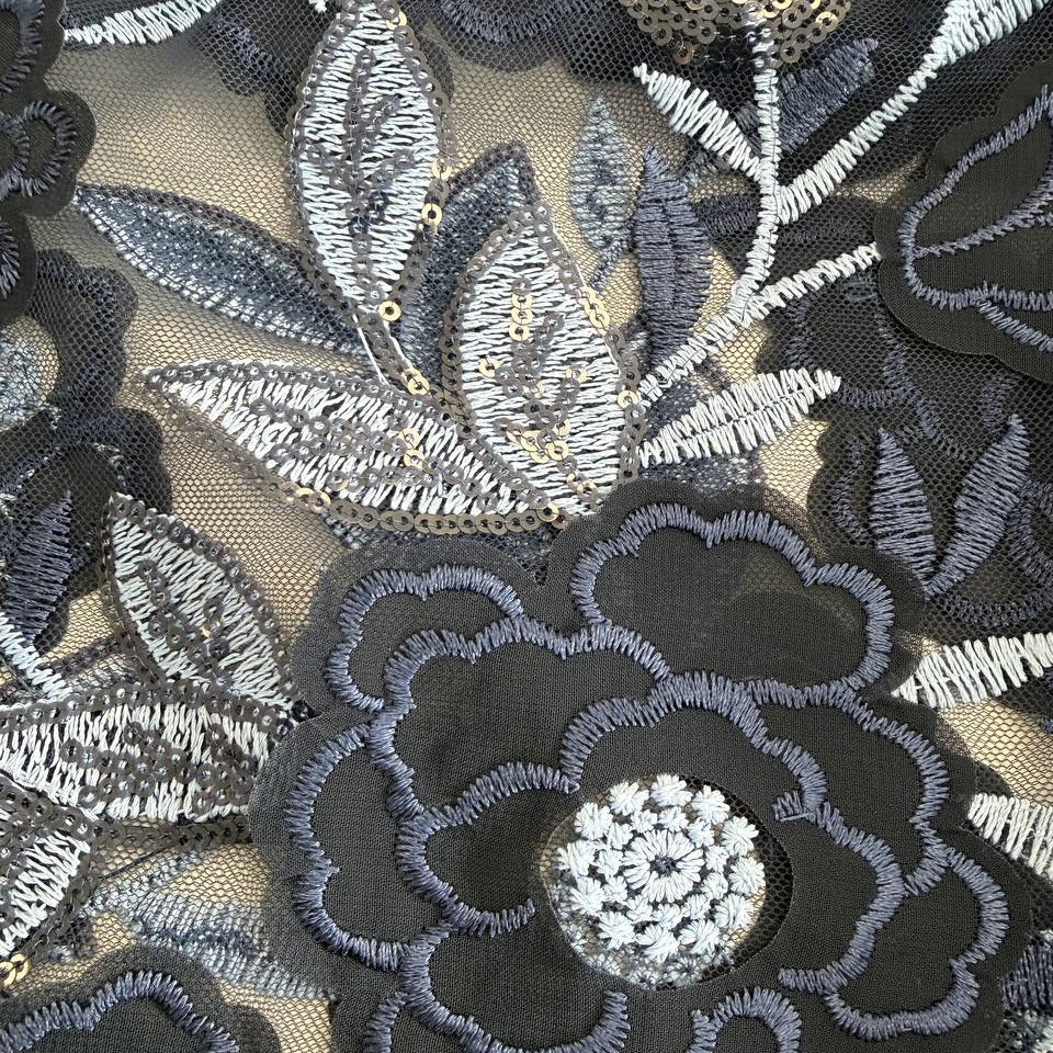 Navy embroidered lace fabric with floral pattern and sequins