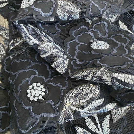 Navy embroidered lace fabric with floral pattern and sequins