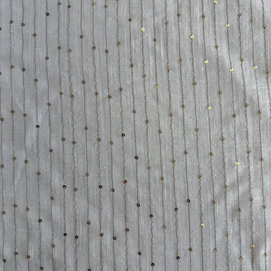 White linen blend fabric with vertical gold sequin lines