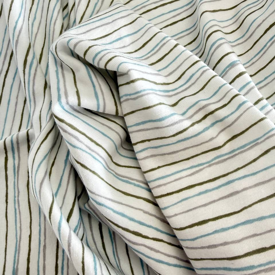 Light grey cotton jersey knit fabric with subtle melange texture